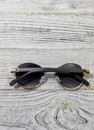 Солнцезащитные очки овальные,, унисекс в золотистой металлической оправе  (без бренда)5 фото
