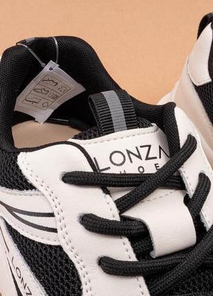 Жіночі кросівки шкіряні білі чорні демісезонні 36-41 кроссовки женские кожаные lonza4 фото