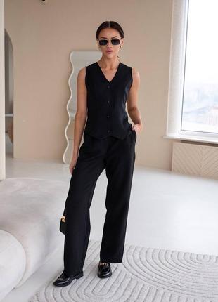 Трендовий жіночий діловий костюм жилетка і брюки незвичайний комплект