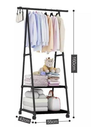 Универсальная прочная напольная передвижная вешалка для одежды coat rack traingular9 фото