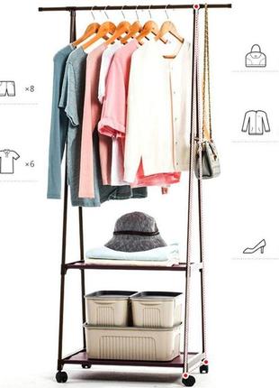 Универсальная прочная напольная передвижная вешалка для одежды coat rack traingular8 фото