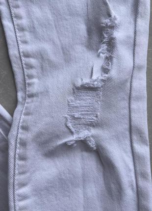 Стильные стрейчевые джинсы с потертостями2 фото