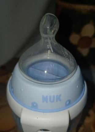 Пляшечка для годування nuk з силіконовою соскою. німеччина+подарунок9 фото