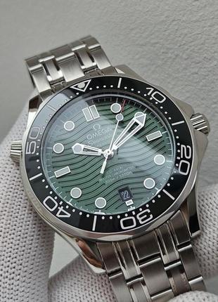 Omega seamaster green 300m3 фото