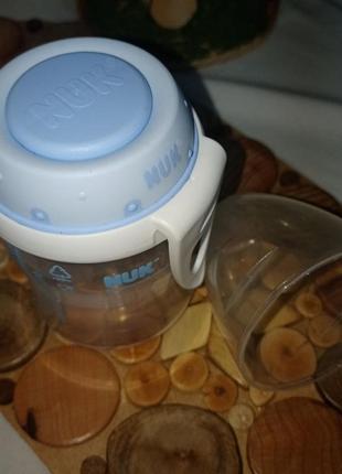 Бутылочка nuk без соски для хранения грудного молока. германия+подарок2 фото