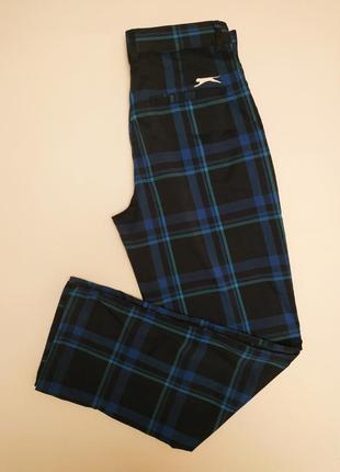 Шикарні легкі брюки в клітку, завужені до низу