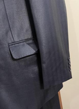 Мужской костюм uomo lardini черного цвета 52 размер