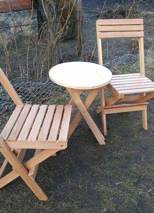 Набір дерев'яних розкладних меблів (стіл +2 стільці)6 фото