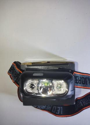 Компактний налобний ліхтарик з дадчиком2 фото