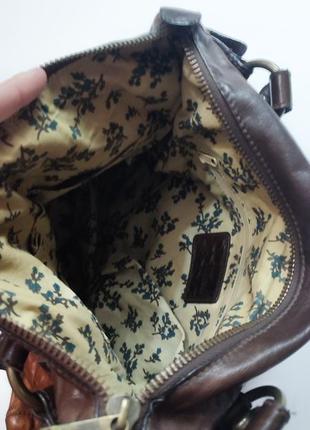 Кожаная сумка в винтажном стиле7 фото