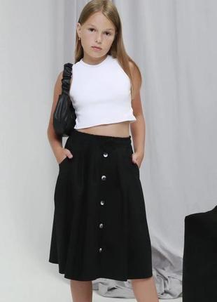 Шкільна спідниця для дівчинки