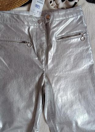 Новые серебристые блестящие брюки5 фото