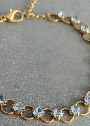 Браслет в золотом тоне стразы голубый кристалл4 фото