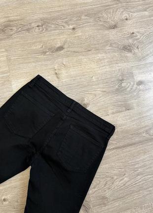 Скіні стретч чорні обтягуючі джинси з вирізами порізами на колінах6 фото