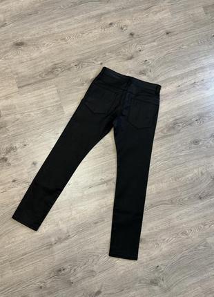 Черные обтягивающие стретч стрейч джинсы с блестящим эффектом4 фото