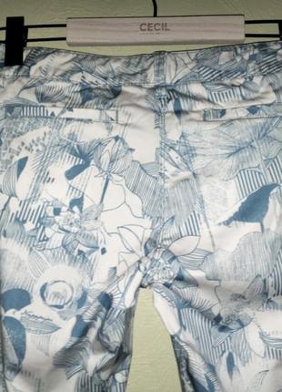 Женские подростковые голубые брюки с цветами napapijri4 фото