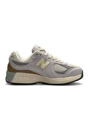 Женские кроссовки new balance 2002r light grey серые повседневные замшевые кросы нью баланс7 фото