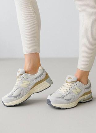 Женские кроссовки new balance 2002r light grey серые повседневные замшевые кросы нью баланс9 фото