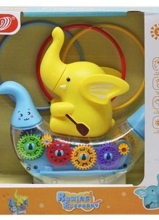Музыкальная игрушка "слоник в лодке" (желтый)