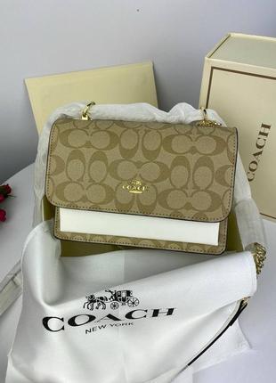 Жіноча сумка coach mini beige коач міні бежева ділова сумочка1 фото