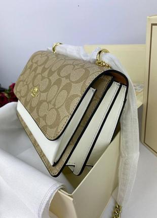 Жіноча сумка coach mini beige коач міні бежева ділова сумочка7 фото