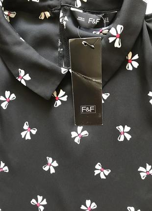 Нереально красивая и стильная брендовая блузка в бантиках.4 фото
