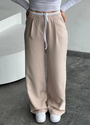 Трендові штани в стилі зара з високою посадкою на резинці шнурком вільного крою широкі з подвійним поясом5 фото