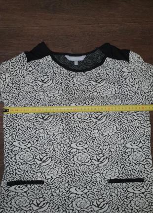 Трикотажна блуза з квітковим малюнком3 фото