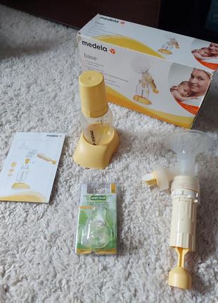 Молокоотсос medela