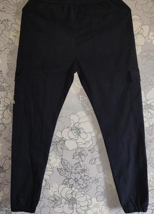 Плотные брюки карго на резинке nike l2 фото