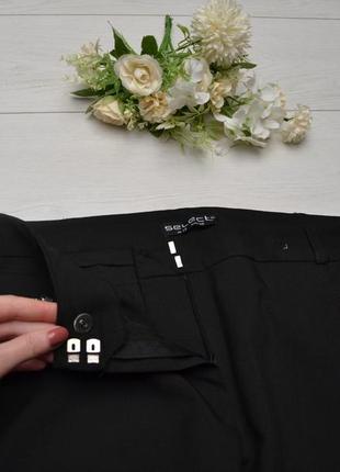 Красиві чорні штани з замочками select.3 фото