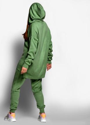 Зеленый вязаный костюм7 фото