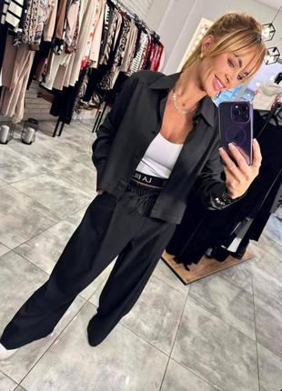 Стильный женский деловой костюм рубашка и широкие брюки свободного кроя