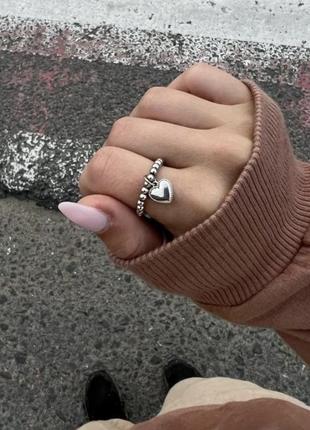 Кольцо кольцо бусины сердце серебряного цвета безразмерное кольццо2 фото