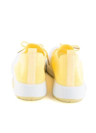 Женские бело-желтые кроссовки из текстиля2 фото