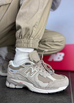 New balance 2002r protection pack driftwood женские кроссовки Сендебиленс замша