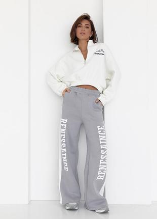 Теплые трикотажные штаны с лампасами и надписью renes saince - светло-серый цвет, l3 фото