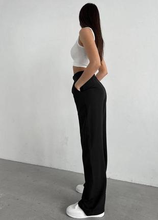 Женские брюки палаццо из костюмной ткани, классические, широкие брюки на высокой посадке, базовые, черные, расширенные5 фото