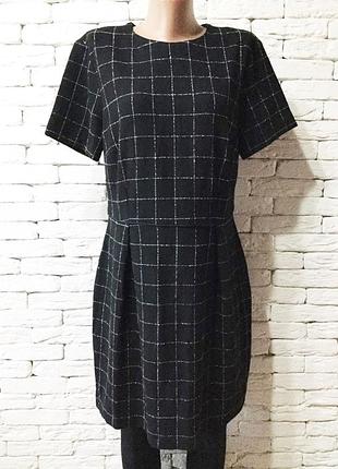 Сукня в клітинку в офісному стилі
