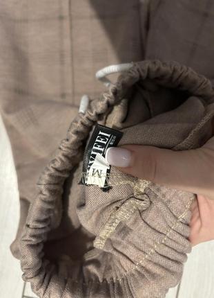 Классические брюки в клетку