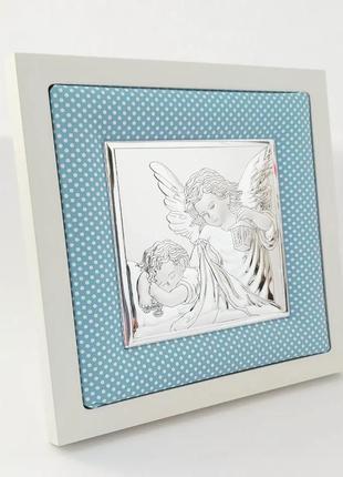 Срібний образ ікона ангел охоронець в ліжечко на дерев'яній основі 14смх14см з синім текстилем образок для дівчинки2 фото