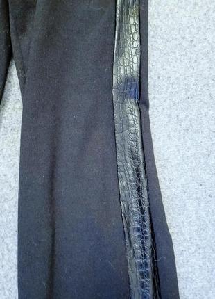 Штани чорного кольору від бренду oodji2 фото
