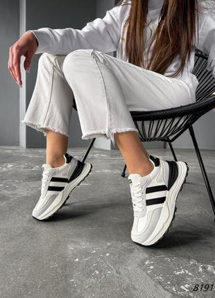 Распродажа светло - бежевые очень стильные кроссовки с серыми и черными вставками3 фото