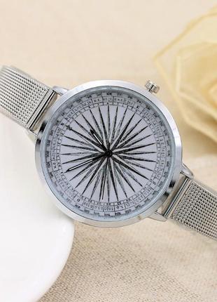 Зовнішній годинник жіночий travel compass silver1 фото