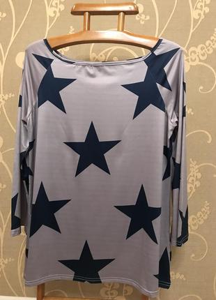 Очень красивая и стильная кофточка-туника в звёздах.