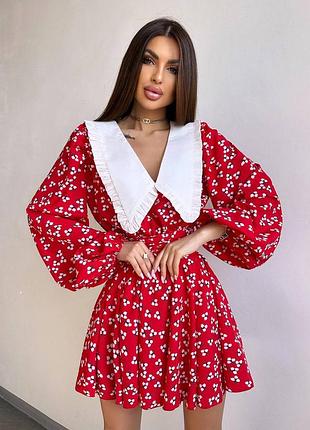 Сукня з коміром та об'ємними рукавами з широким поясом