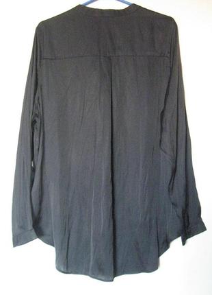 Блуза черная с воланом3 фото