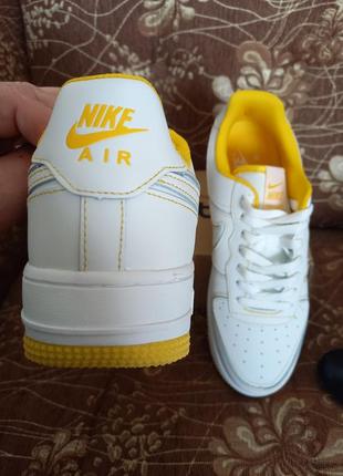 Кросівки чоловічі шкіряні біло-жовті nike air8 фото