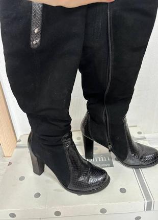 Зимние кожаные сапоги на каблуке2 фото