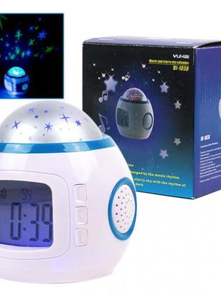 Музыкальный ночник-проектор звездное небо 1038 с часами и будильником3 фото